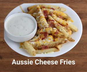 Crispy Aussie cheese fries loaded with melted cheddar and chopped bacon – Outback Steakhouse favorite side dish