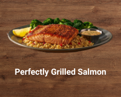 Perfectly Grilled Salmon – fresh Atlantic salmon fillet seasoned and flame-grilled, served with seasonal vegetables – healthy Outback Steakhouse seafood
